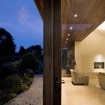 Dusk view of the portico area with timber ceiling