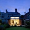 Night time view of the house and new extension