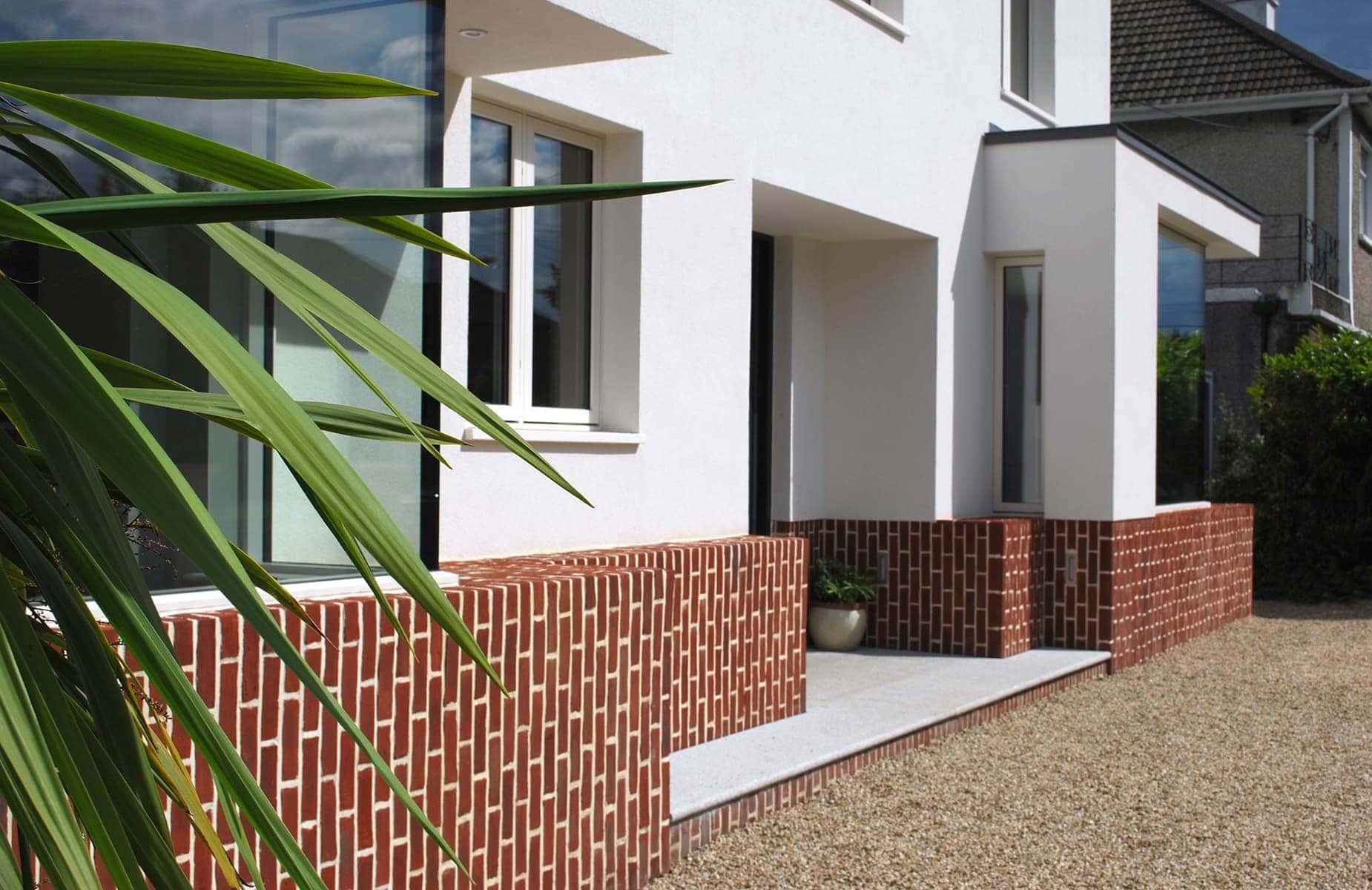 Brick plinth detail to front elevation of house rebuild