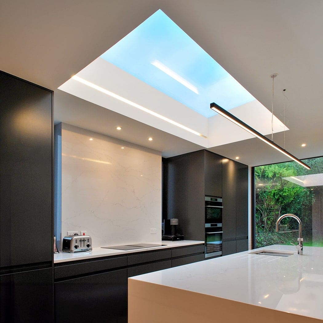 Large rooflight over built-in kitchen