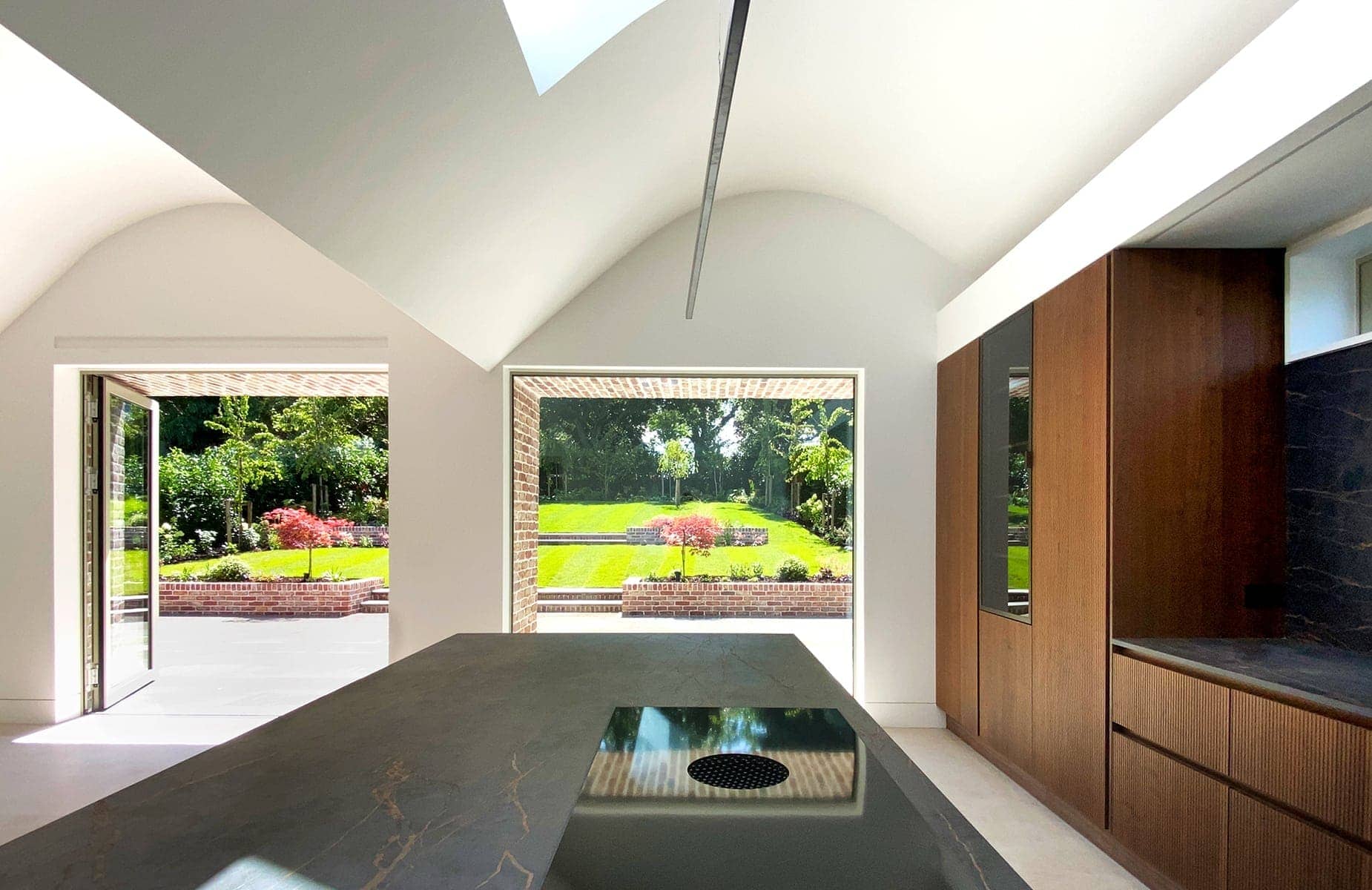 Vaulted ceiling over built-in kitchen