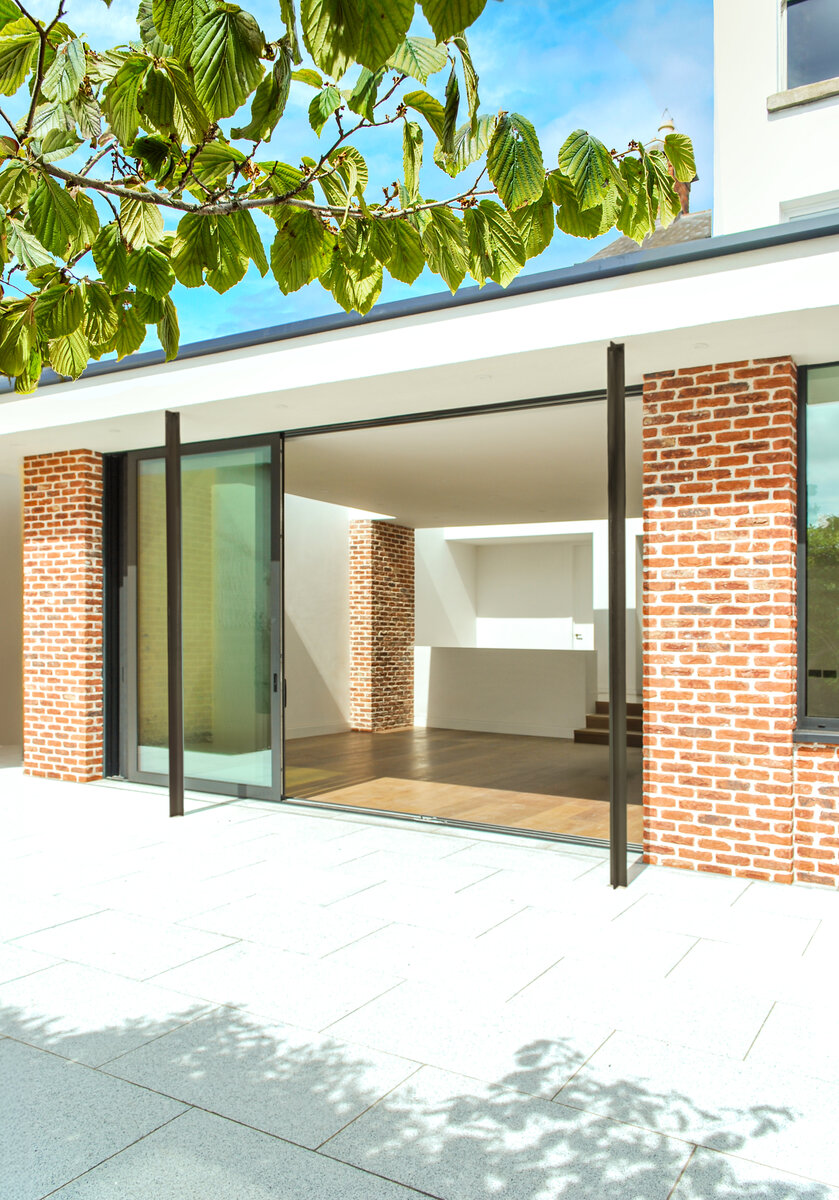 The interior spaces opens up seamlessly to a suntrap patio