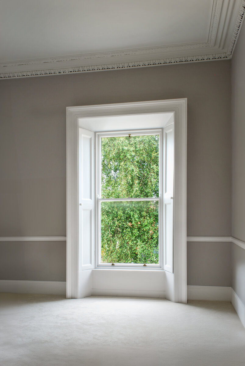 Original sash windows and shutter boxes