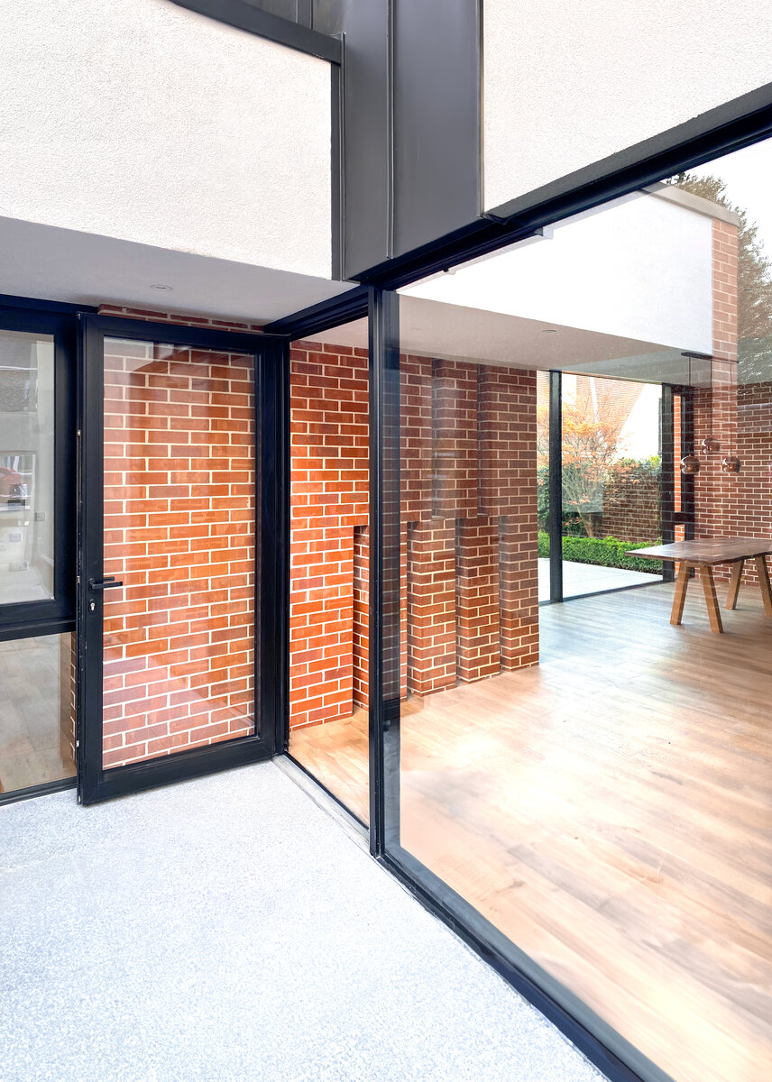 Glazing detail to the side of the house with view through to the rear garden