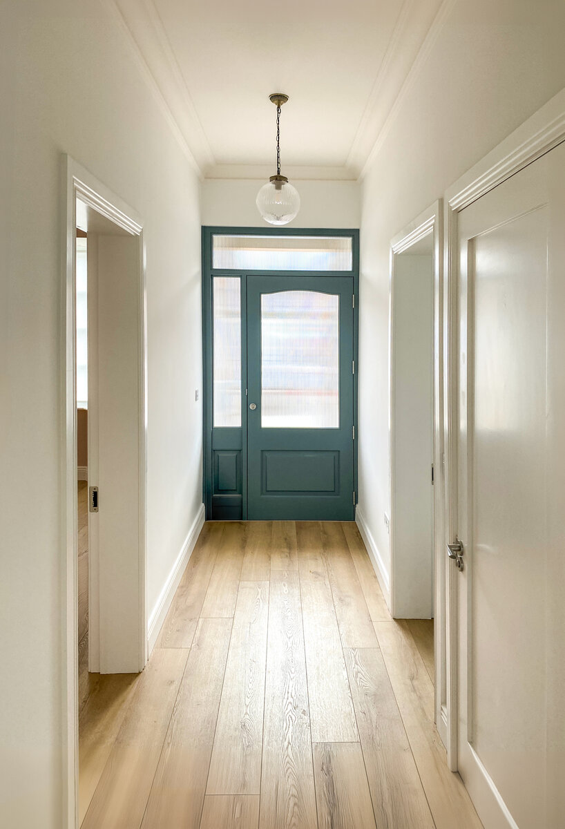 Entrance hall looking back to the hall door which is identical to the original but is now accessible