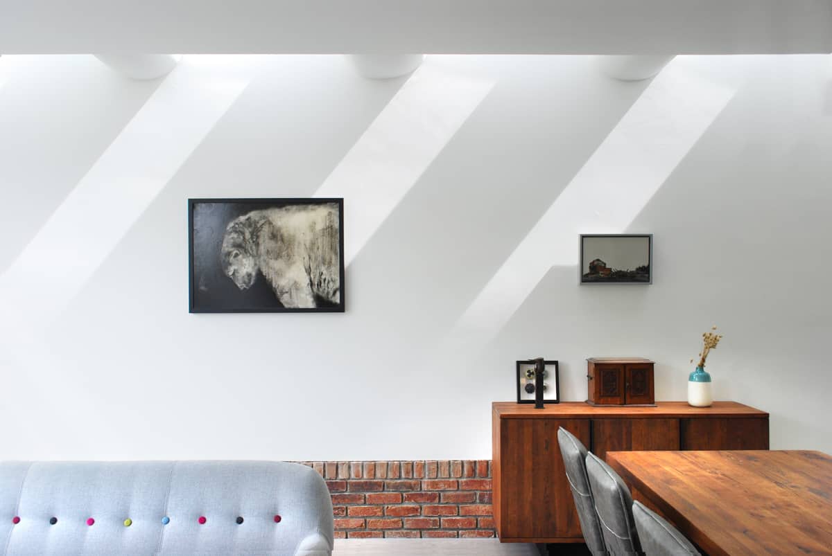 Rooflights with curved plasterboard create a feature of natural light