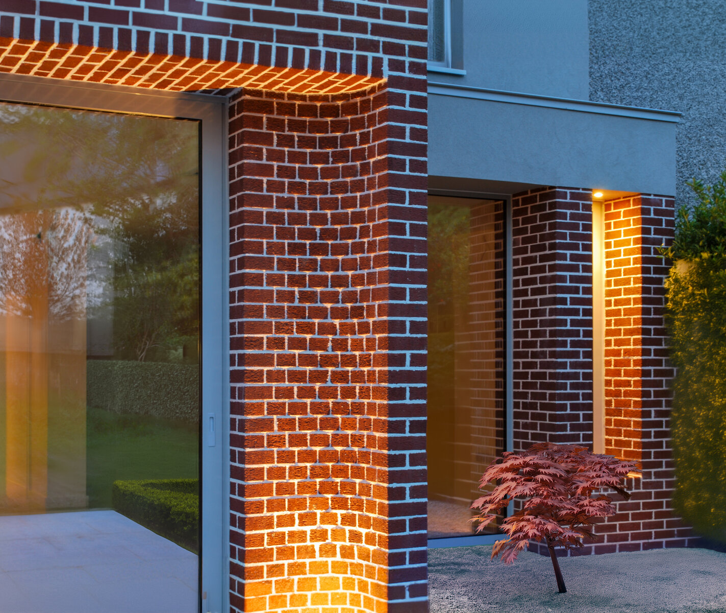 Curved brick pier at dusk lit from below