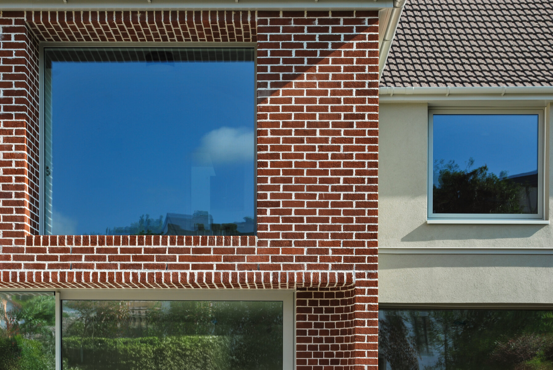 Detail photo of picture window in brick elevation