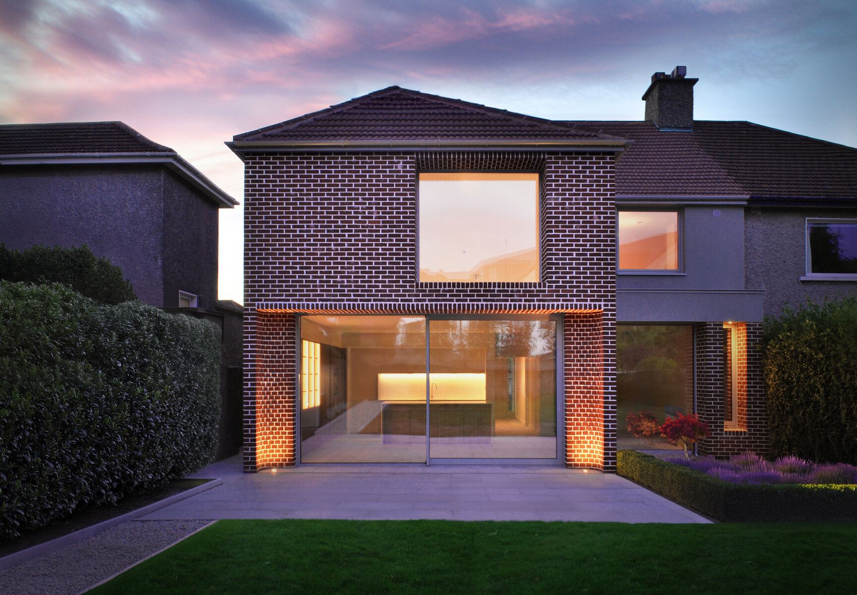 Reconstruction of a 1960s semi-detached house by David Flynn Architects