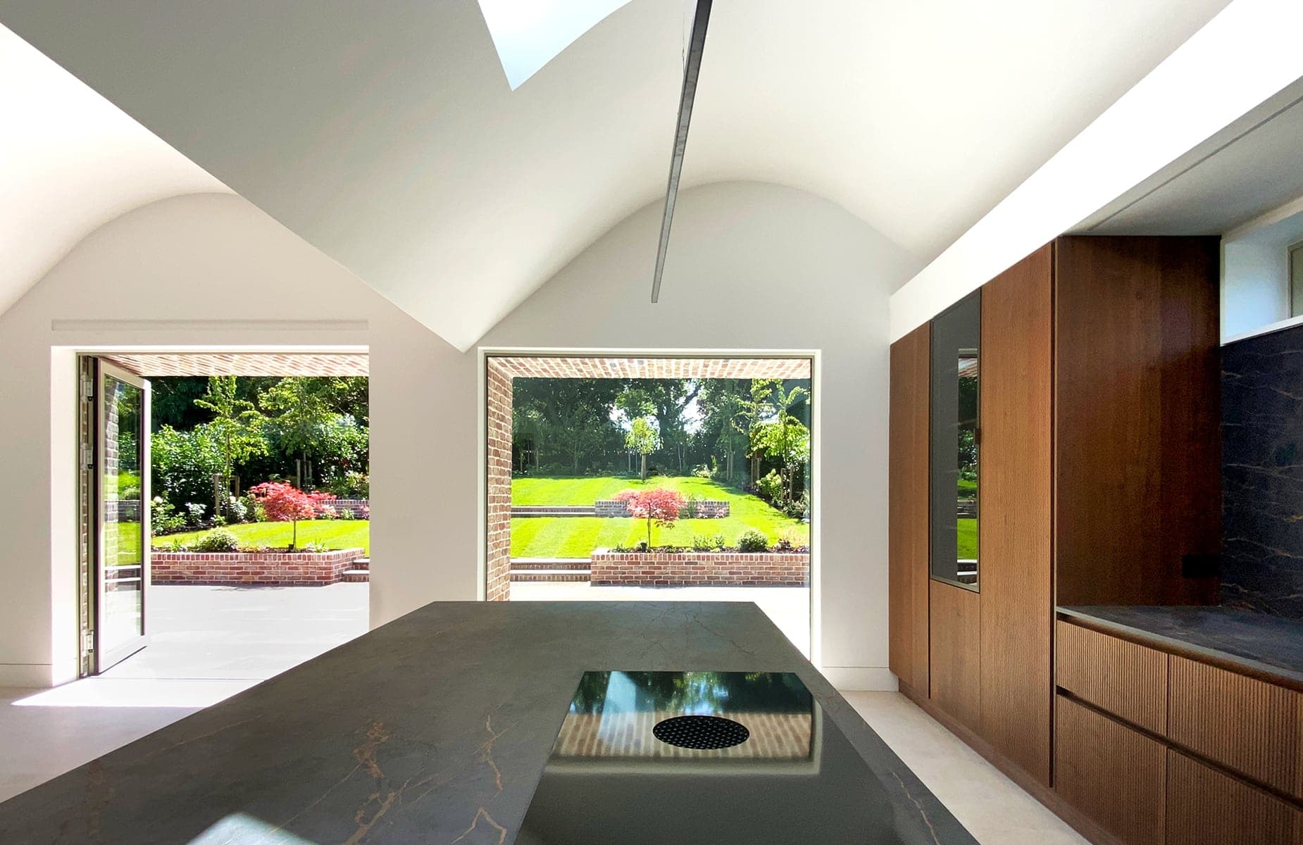 Dublin Architects design a bright kitchen with a skylight and a spacious island, perfect for cooking and entertaining guests
