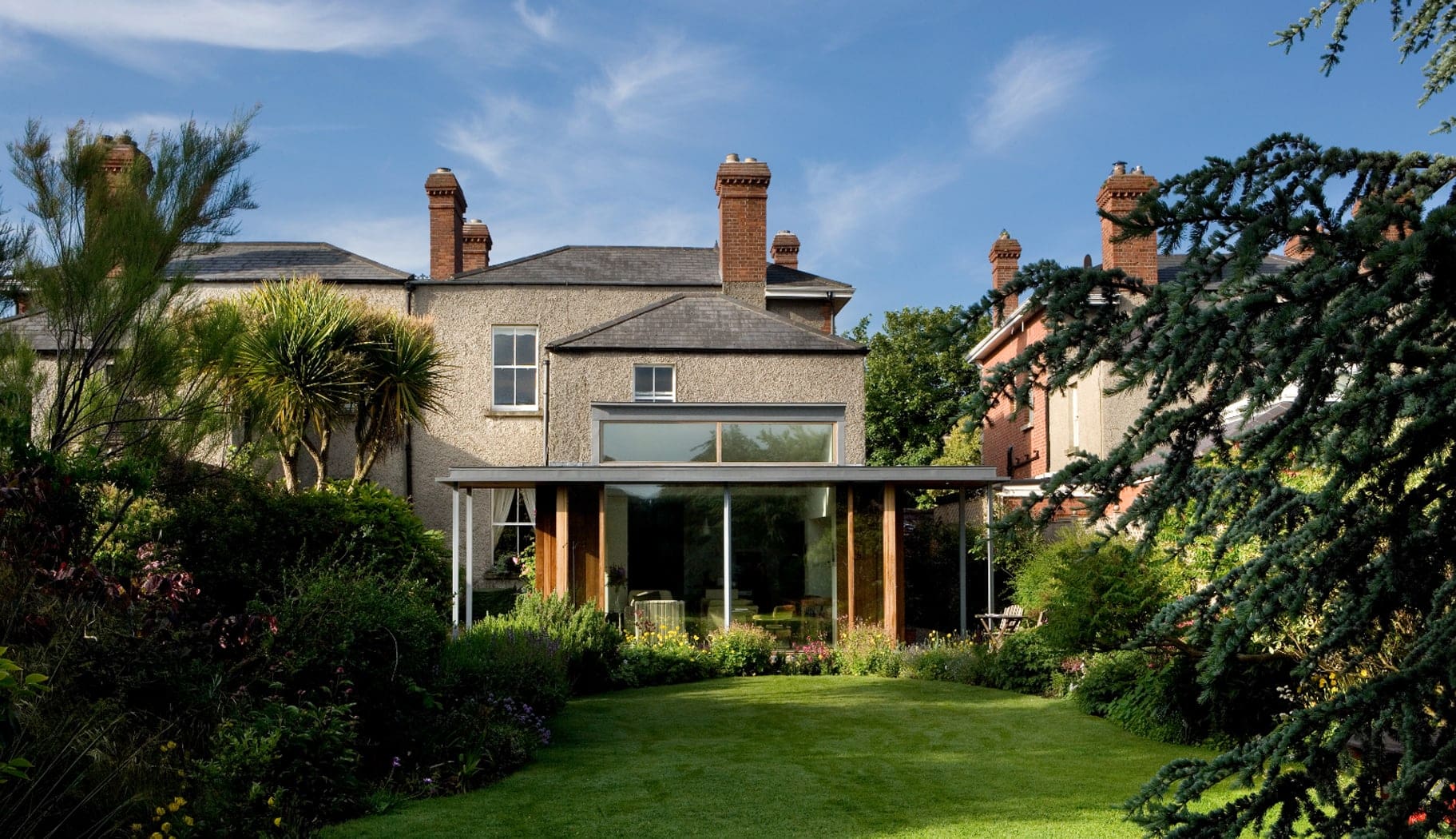 Architects in Dublin design a picturesque home surrounded by a beautiful garden and well-manicured lawn