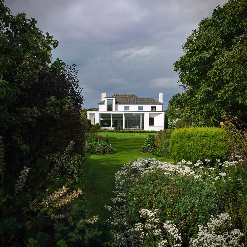 Clonskeagh house rebuild with new elevation overlooking a beautiful garden